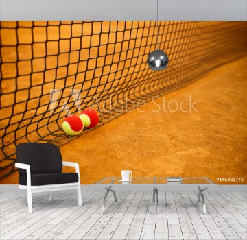 Bild på Tennis red ball on a clay tennis court orange color